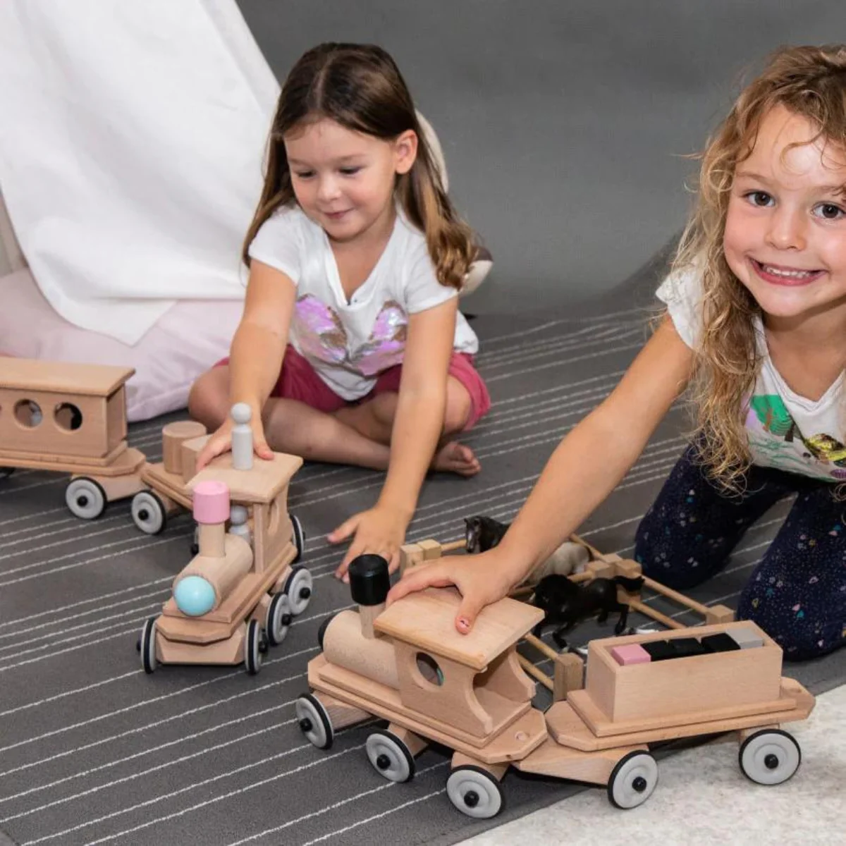 Dynamiko Wooden Steerable Push Along Train with Peg Doll - Image 4