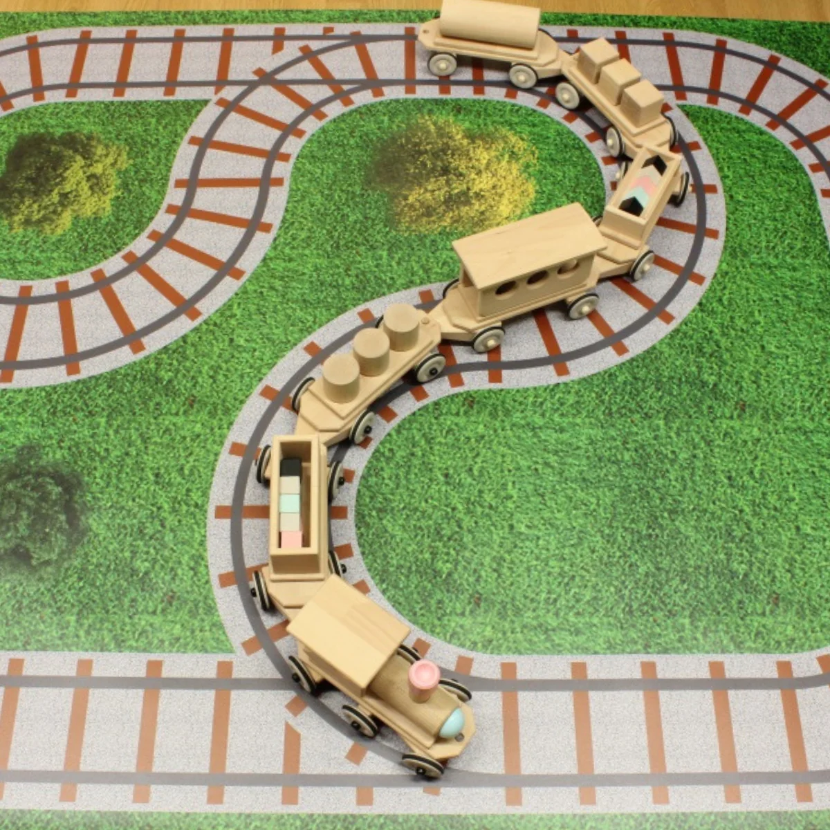 Dynamiko Wooden Steerable Push Along Train with Peg Doll - Image 5